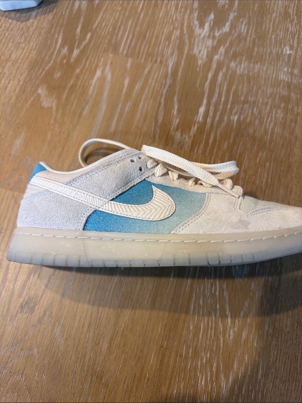 Nike Dunk Low (suede / gum sole variant) light blue cream